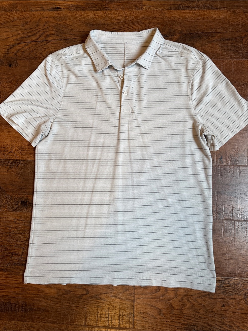 Men’s XL Lululemon ABC polo shirt in a very cool light silver color and stripes.